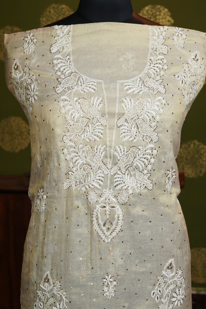 Dress material in Tissue fabric Neckline with Heavy boota with dupatta and Baadla work