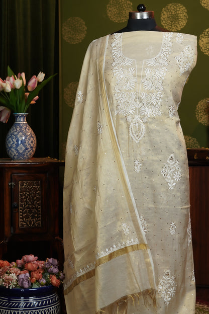 Dress material in Tissue fabric Neckline with Heavy boota with dupatta and Baadla work